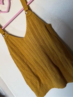 Yellow knit top with ring strap details